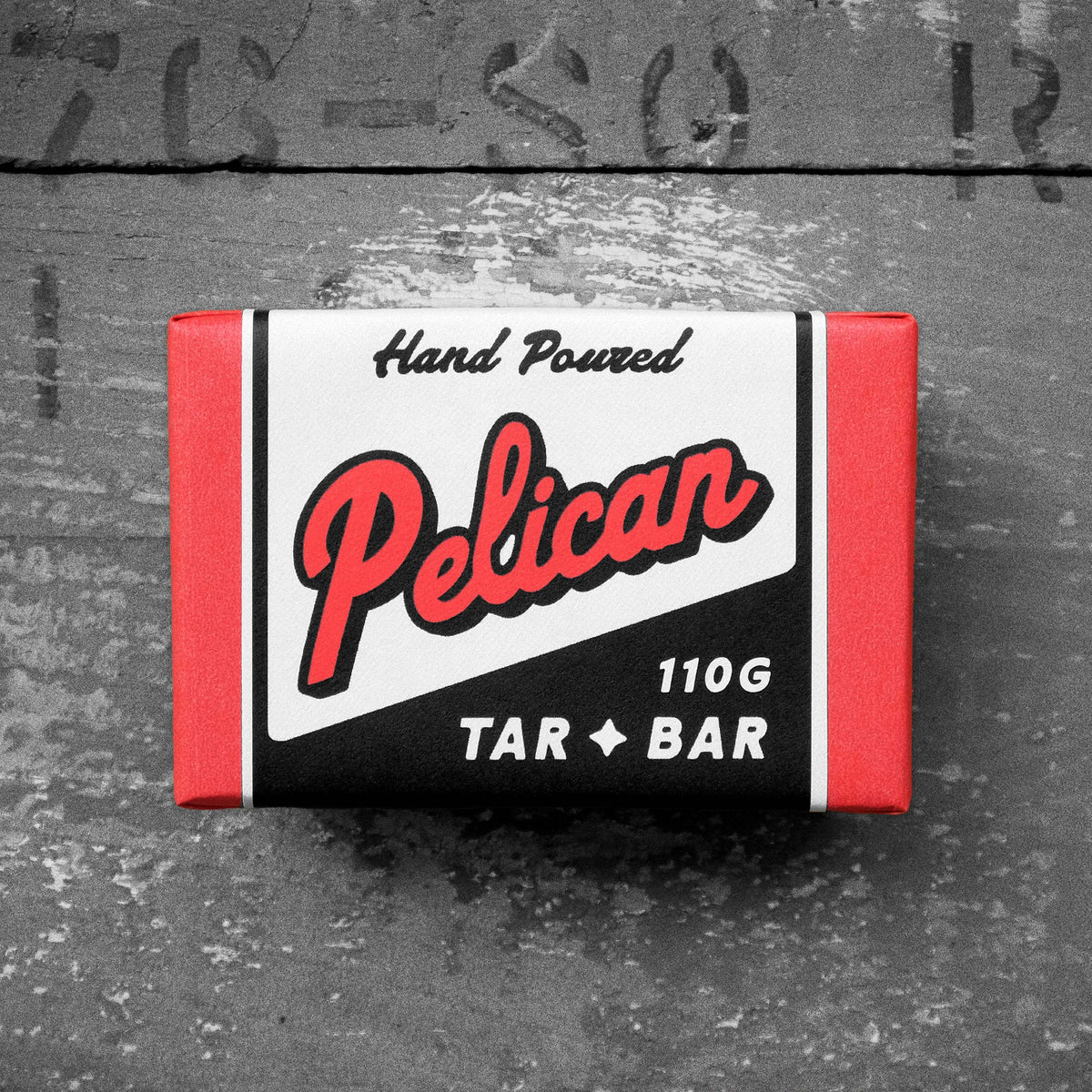 Tar Bar - Classic Pine Tar Grip in a red, white and black paper box labeled Pelican Tar Bar, 110g